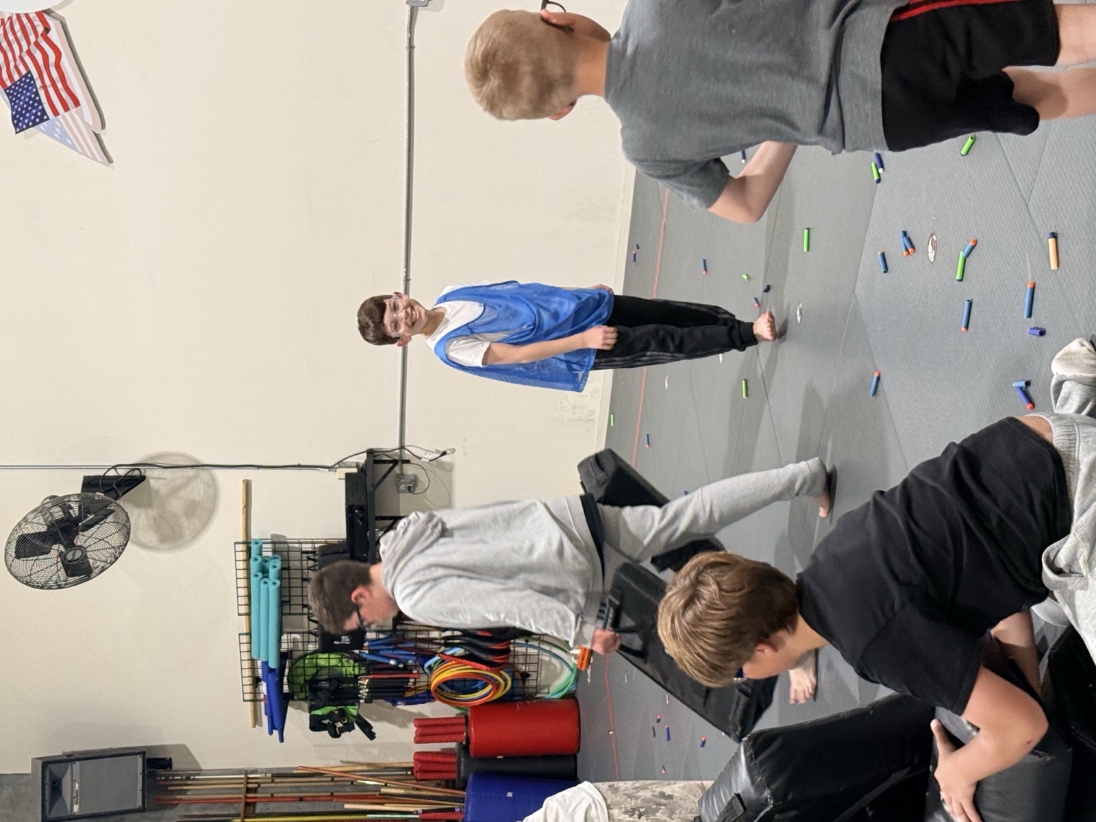 Kids running through the studio during a party