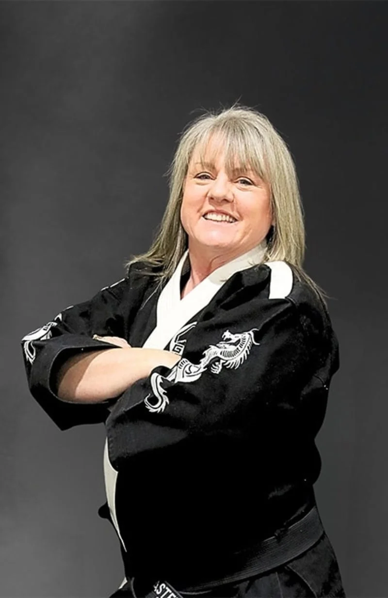 Portrait of Master Heather Neitzell, Chief Instructor at Legacy Martial Arts in Meridian, ID