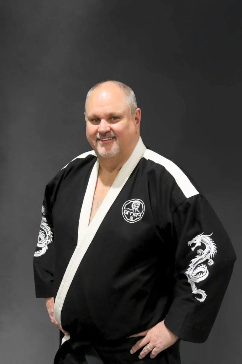 Portrait of Master Jim Neitzell, Chief Instructor at Legacy Martial Arts in Meridian, ID
